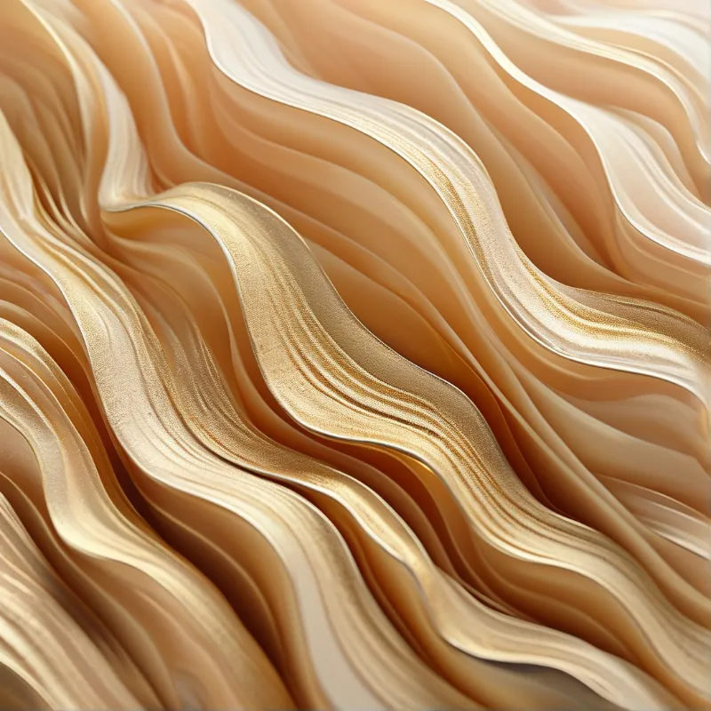 Flowing layered sand dune ripples in warm golden beige tones curve across the whole frame, catching soft directional light.