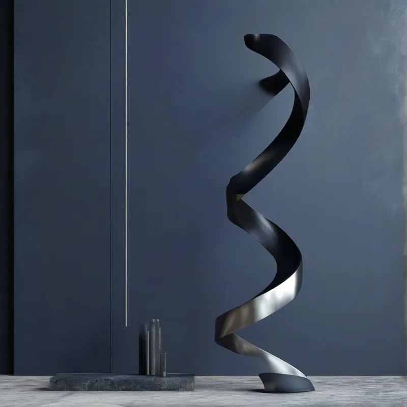 A twisted polished metal spiral sculpture rests beside a dark stone element against a matte blue wall in soft light.
