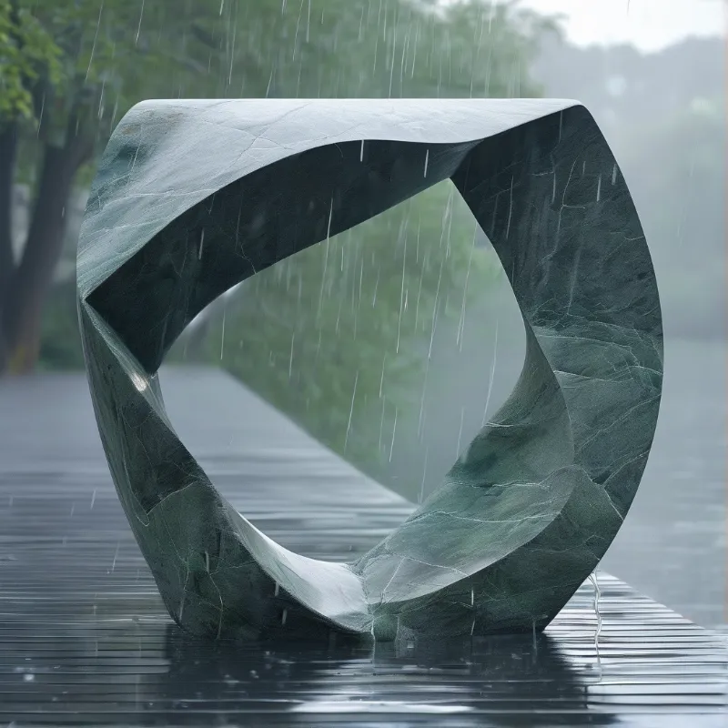 A large twisted metal sculpture sits on a wet wooden surface while it rains in a park.