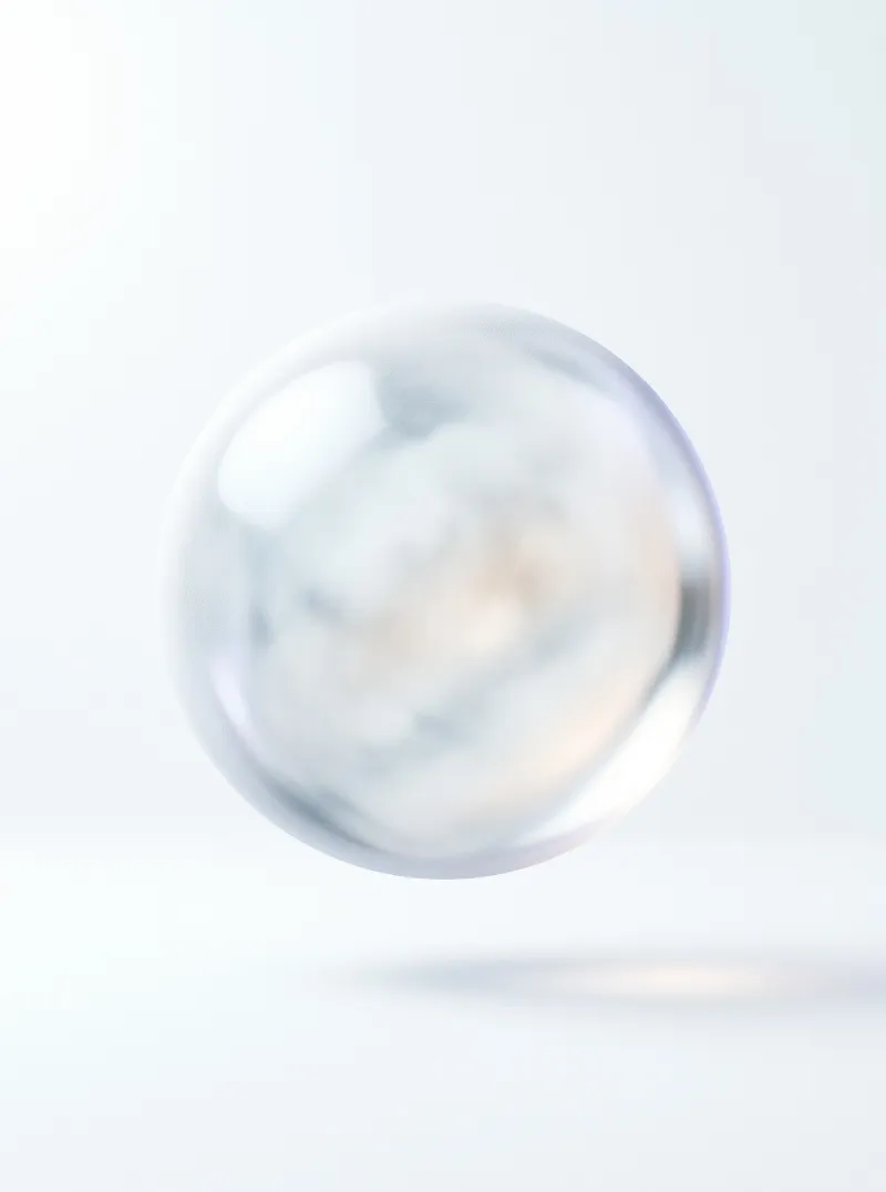 A clear bubble hovers above a white plane showing internal color shifts.
