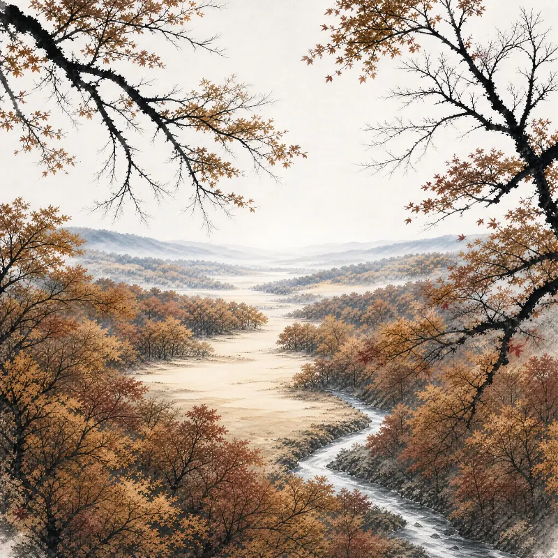 A winding river flows through a valley filled with golden autumn trees, with distant mist-covered hills in the background.