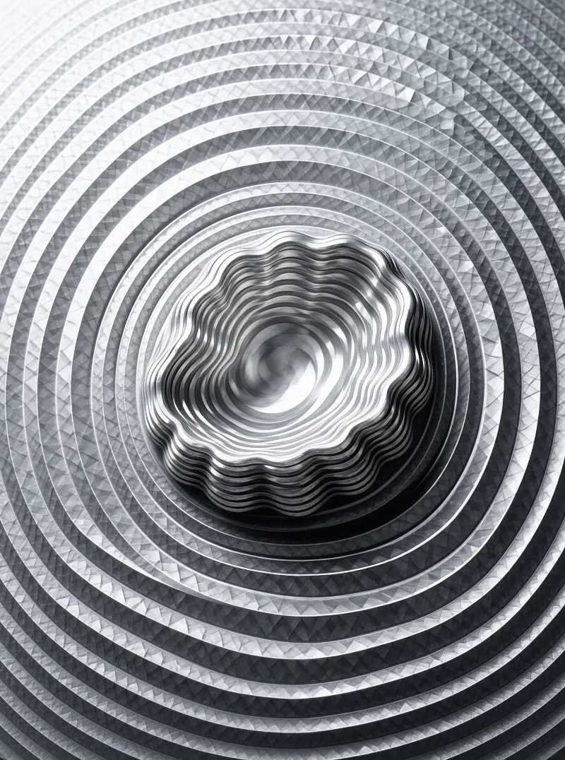 Monochromatic faceted rings transition into smooth wavy metallic bands surrounding a dark swirling central vortex point.