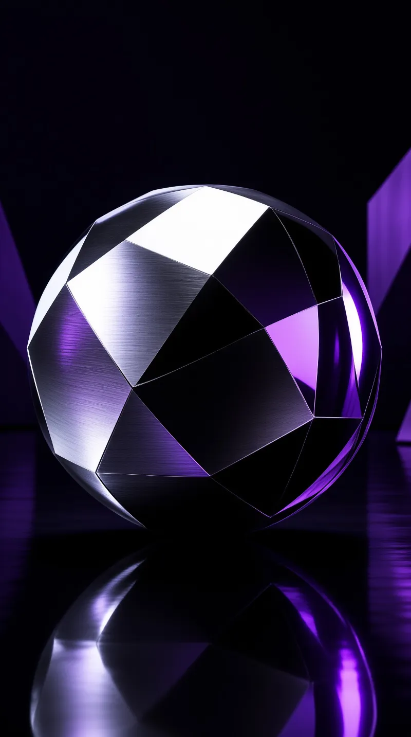 A polygonal ball of brushed steel rests on a dark glossy floor, its far side washed in purple studio light.