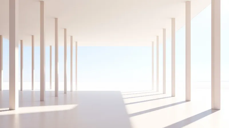 Pale vertical columns line a bright sunlit open minimal hall, with soft daylight casting long even shadows on the pale floor.