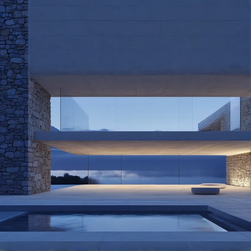 A minimalist structure featuring rough stone walls and concrete beams overlooks a calm pool during twilight.