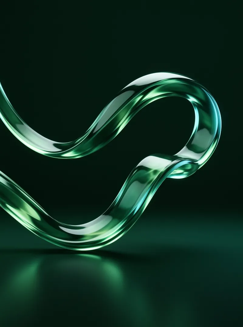 A shiny green glass ribbon twists against a dark background with bright white highlights.