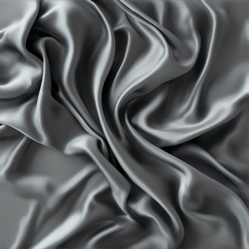 Close-up view of shimmering grey satin fabric with smooth flowing folds and soft highlights