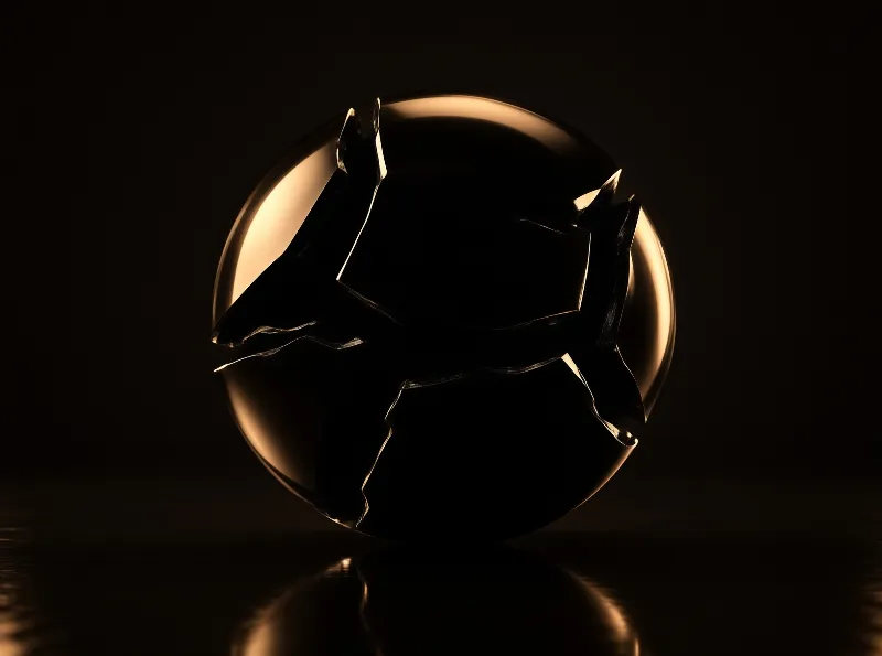 A cracked dark sphere rests on a glossy surface with warm golden rim lighting against a black void.