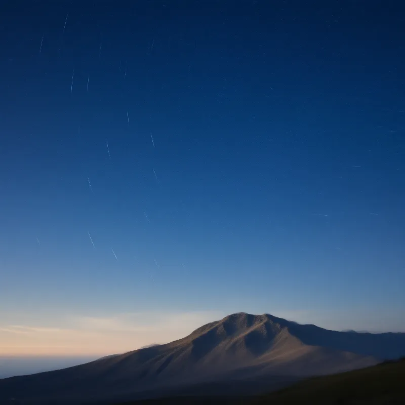 Night Sky with Star Trails and Mountain