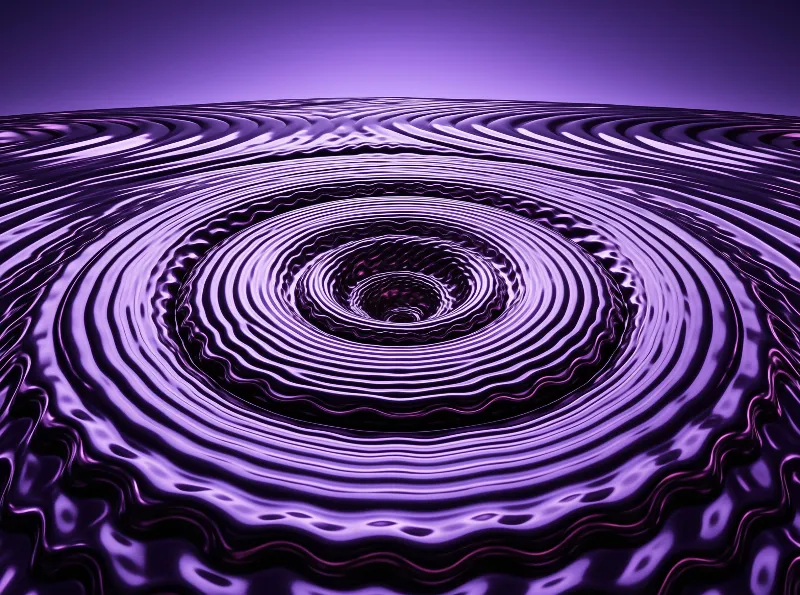 A shiny purple metallic surface displays concentric waves spiraling into a dark central opening.