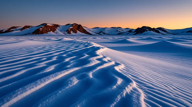 Snowy Mountains at Sunset