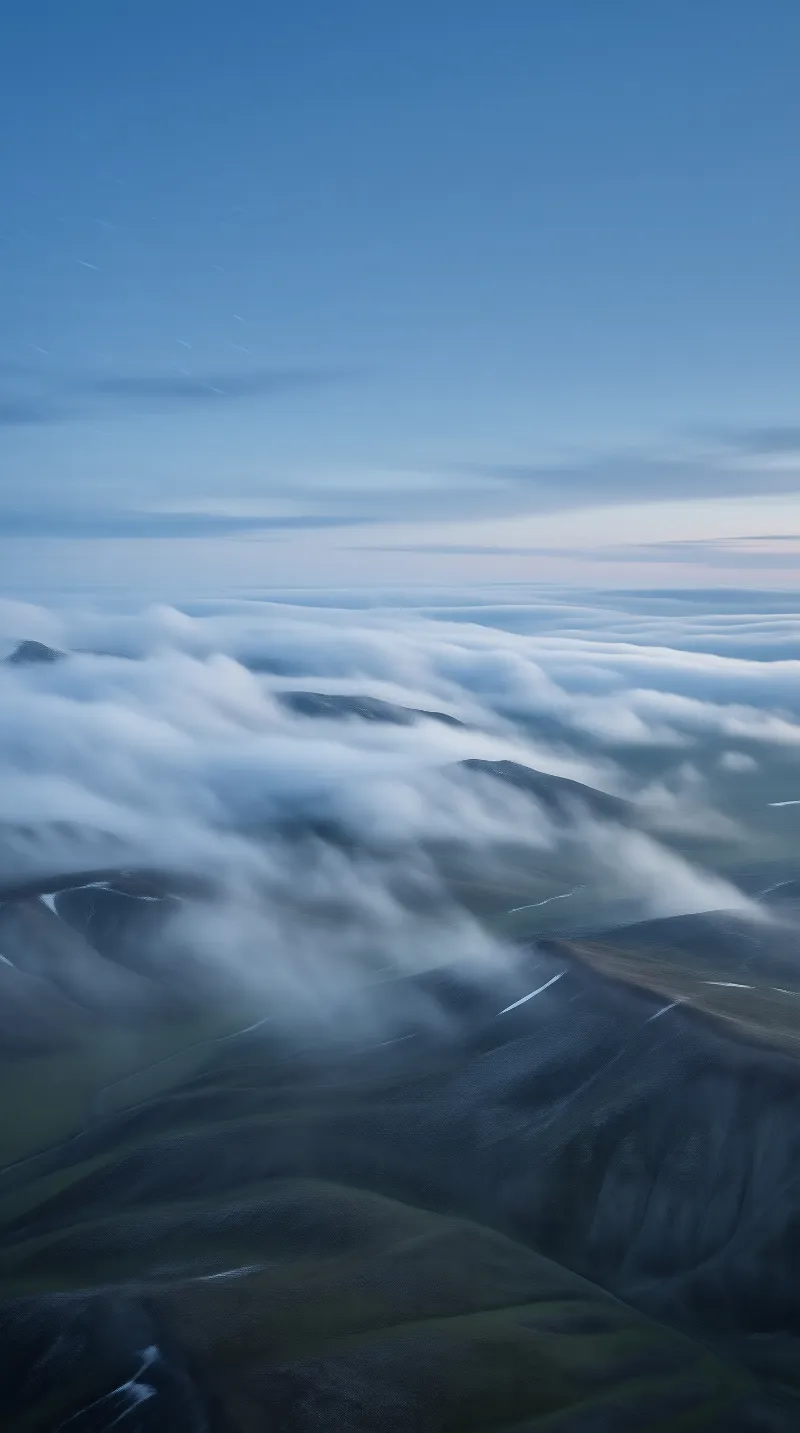 Sea of Clouds Over Mountains