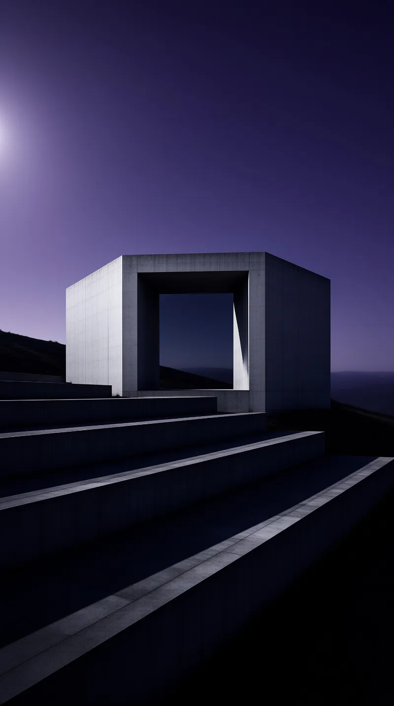 A minimalist concrete cube building stands with wide steps leading to its opening against a deep purple twilight sky.