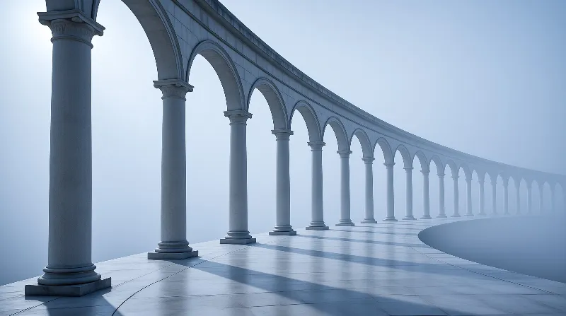 A long row of classical columns and arches fading into dense blue atmosphere.