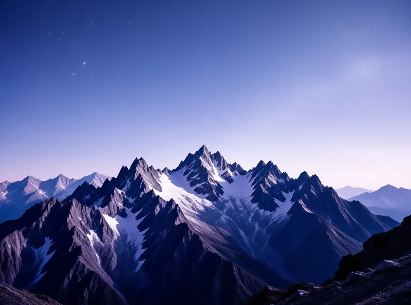 Sharp snow-covered summits rise against a deep indigo sky dotted with faint stars during the early evening hours.