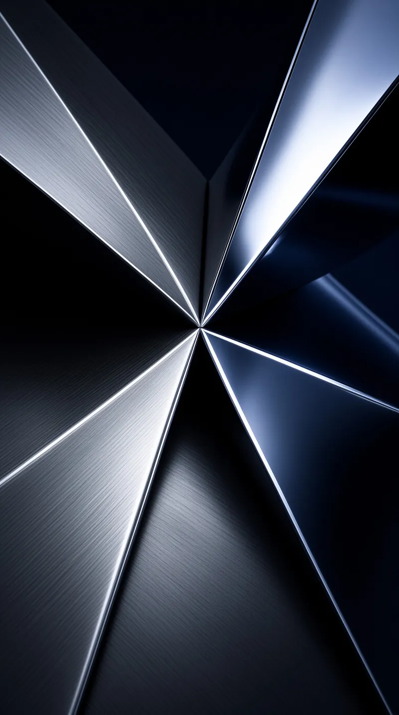 Silver metal surfaces form a star shape with bright highlights and dark blue shadows in a geometric arrangement.