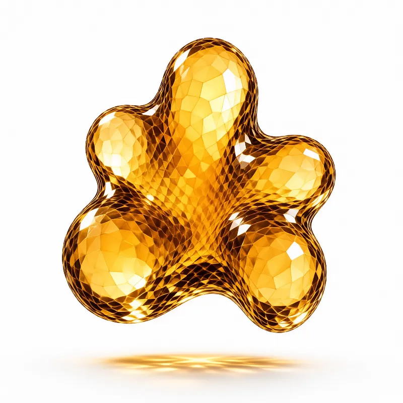 An irregular golden shape with a faceted glass texture hovers against a white background casting a soft shadow below.