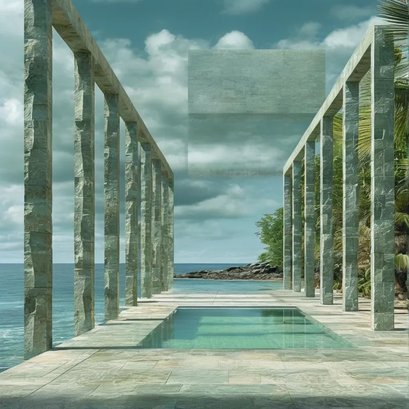 A stone colonnade frames a central pool overlooking the ocean and palm trees under a cloudy sky.