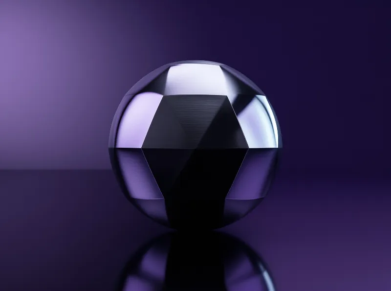 A shiny faceted sphere sits on a reflective plane with a deep violet gradient backdrop.