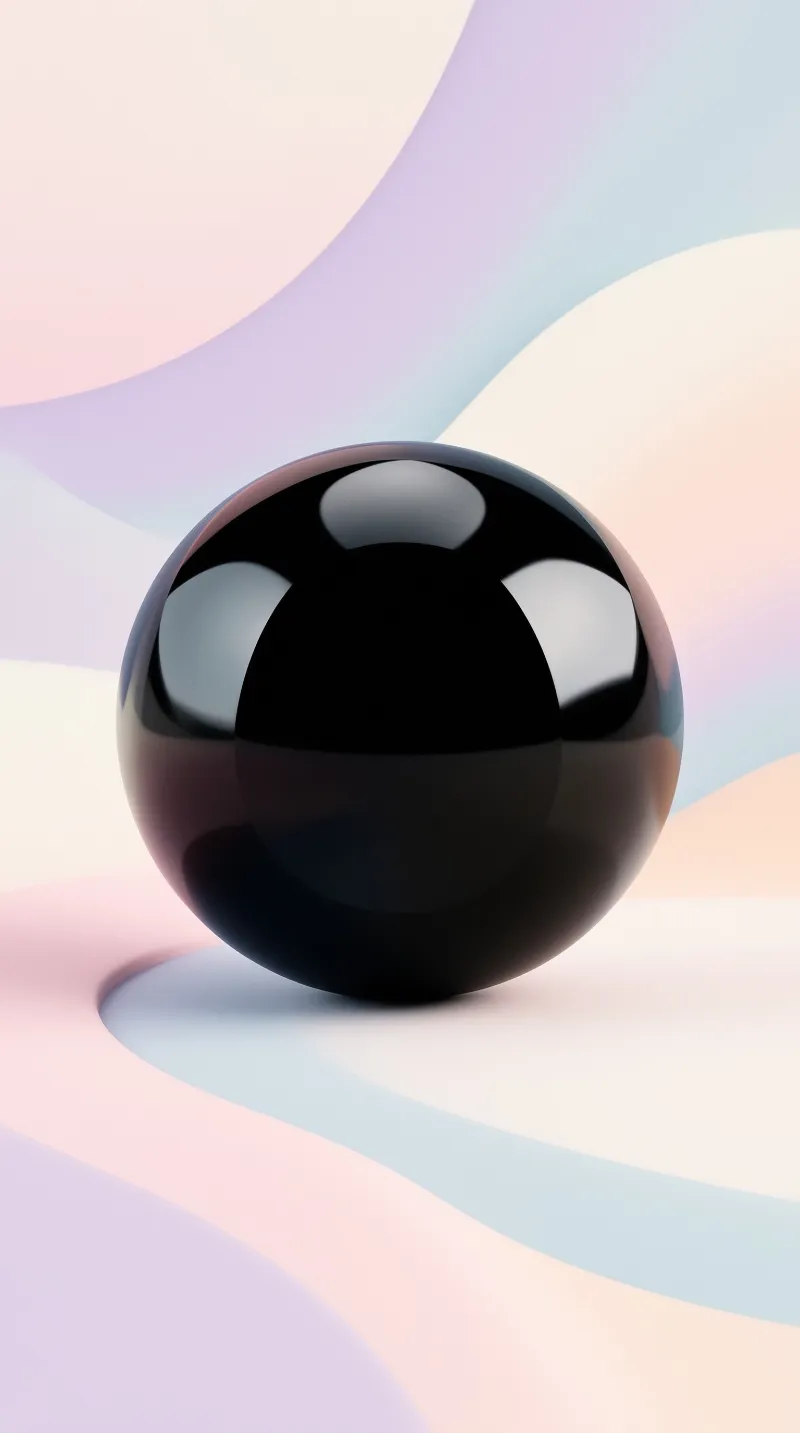 A polished black sphere rests on a smooth surface featuring soft wavy pastel pink and blue patterns.