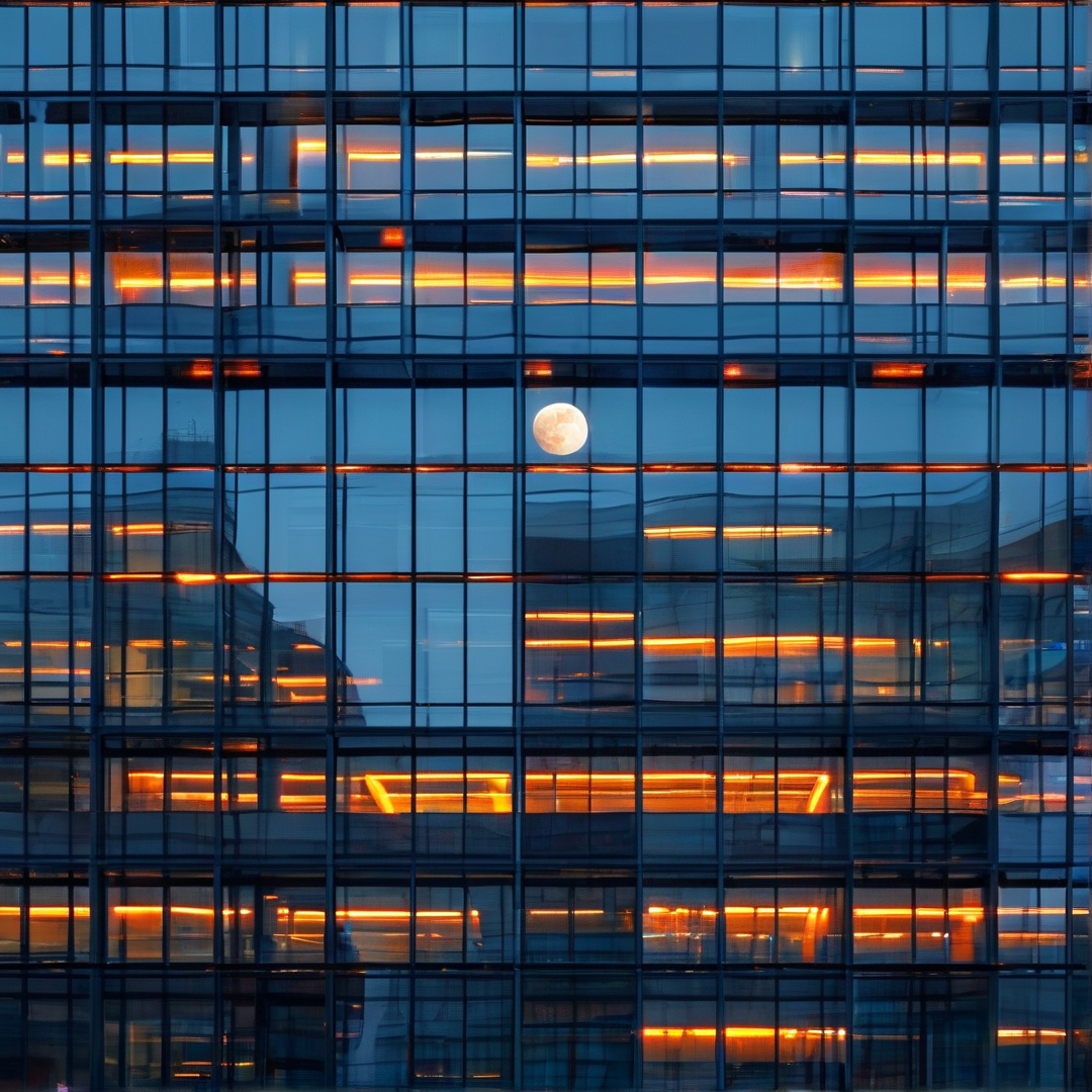 Moon Behind Glass Facade