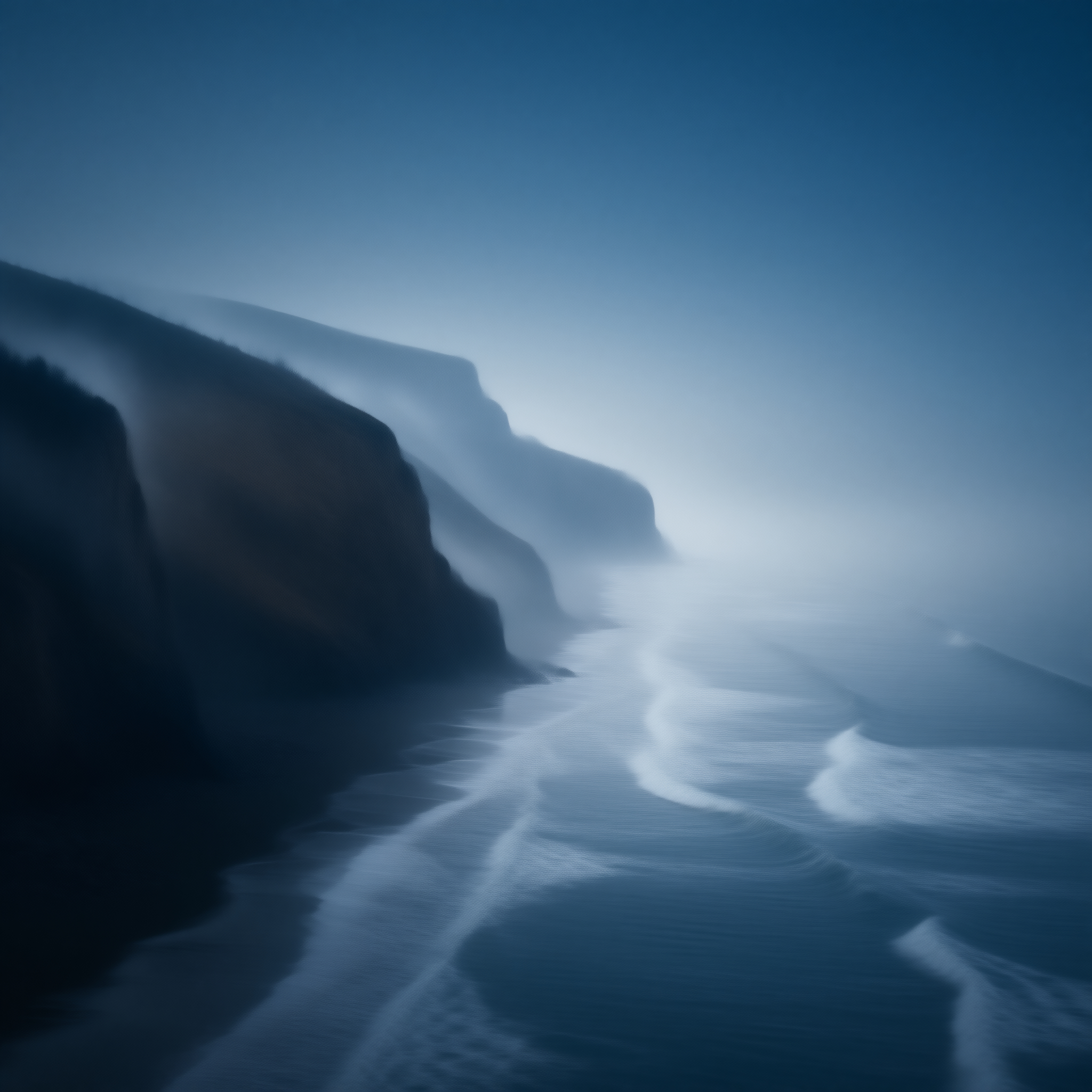 Misty Blue Coastal Cliffs