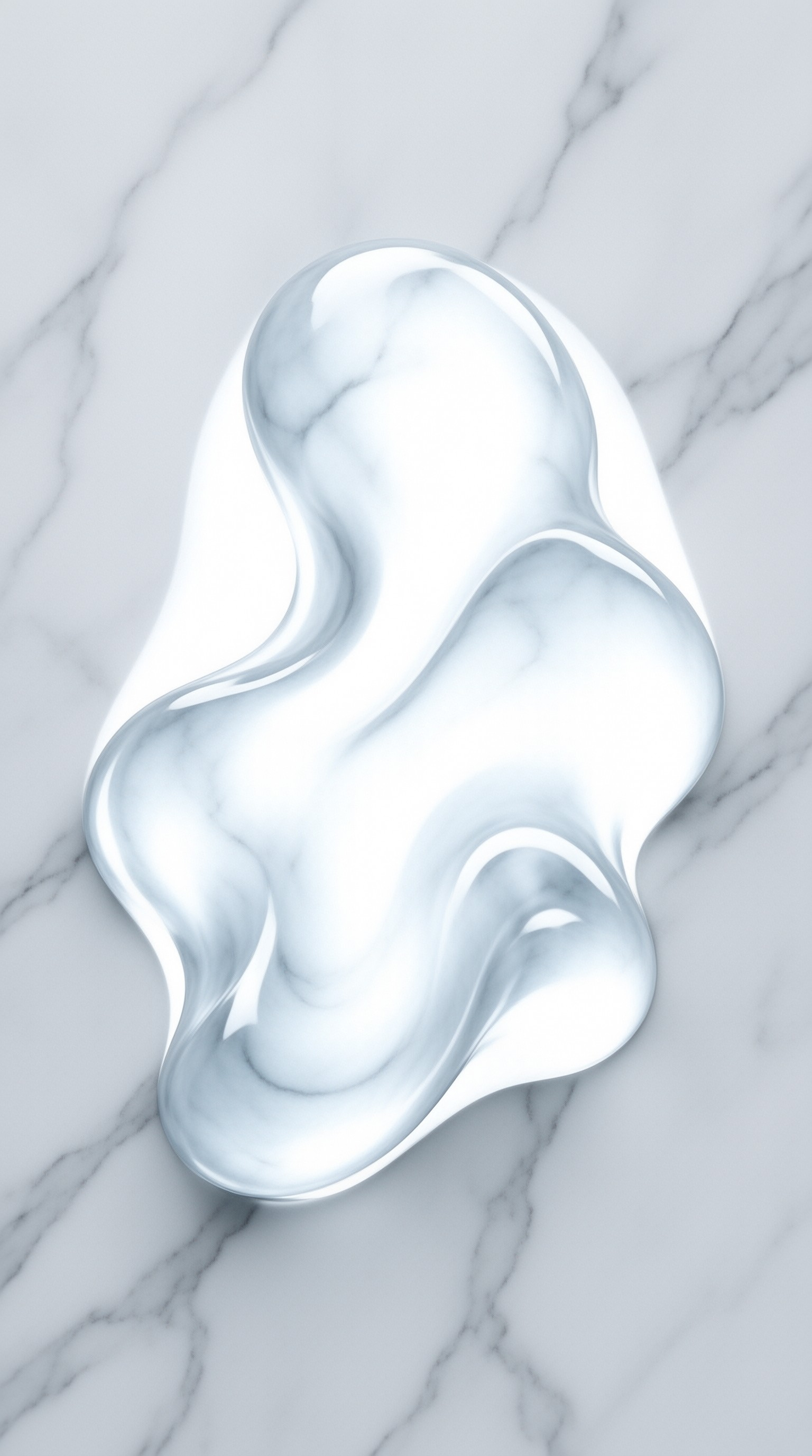 A glossy amorphous shape sits on a white marble surface reflecting cool light.