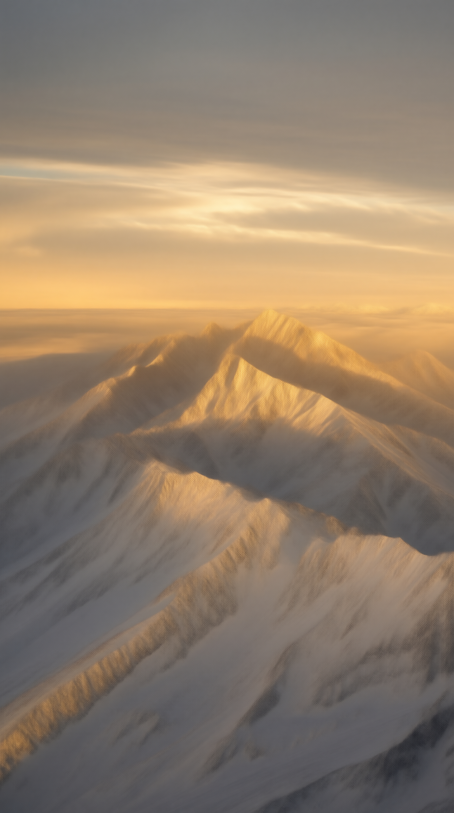 Snowy Peaks in Golden Light