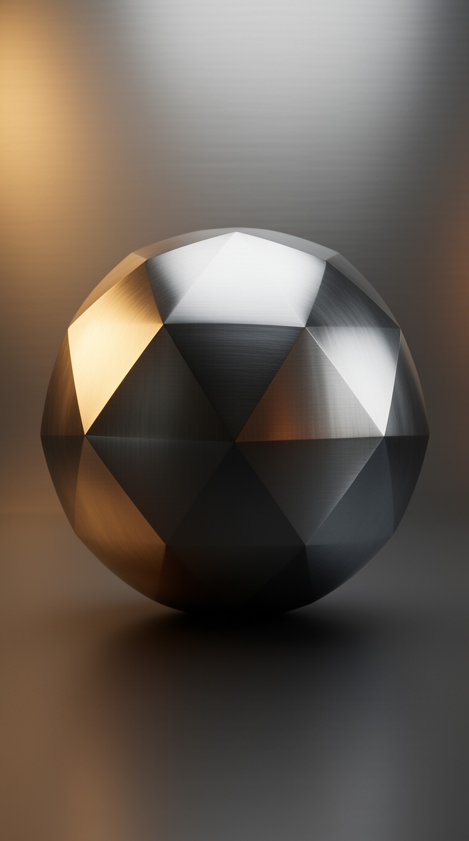 A geometric metal sphere with brushed textures resting on a smooth gradient background