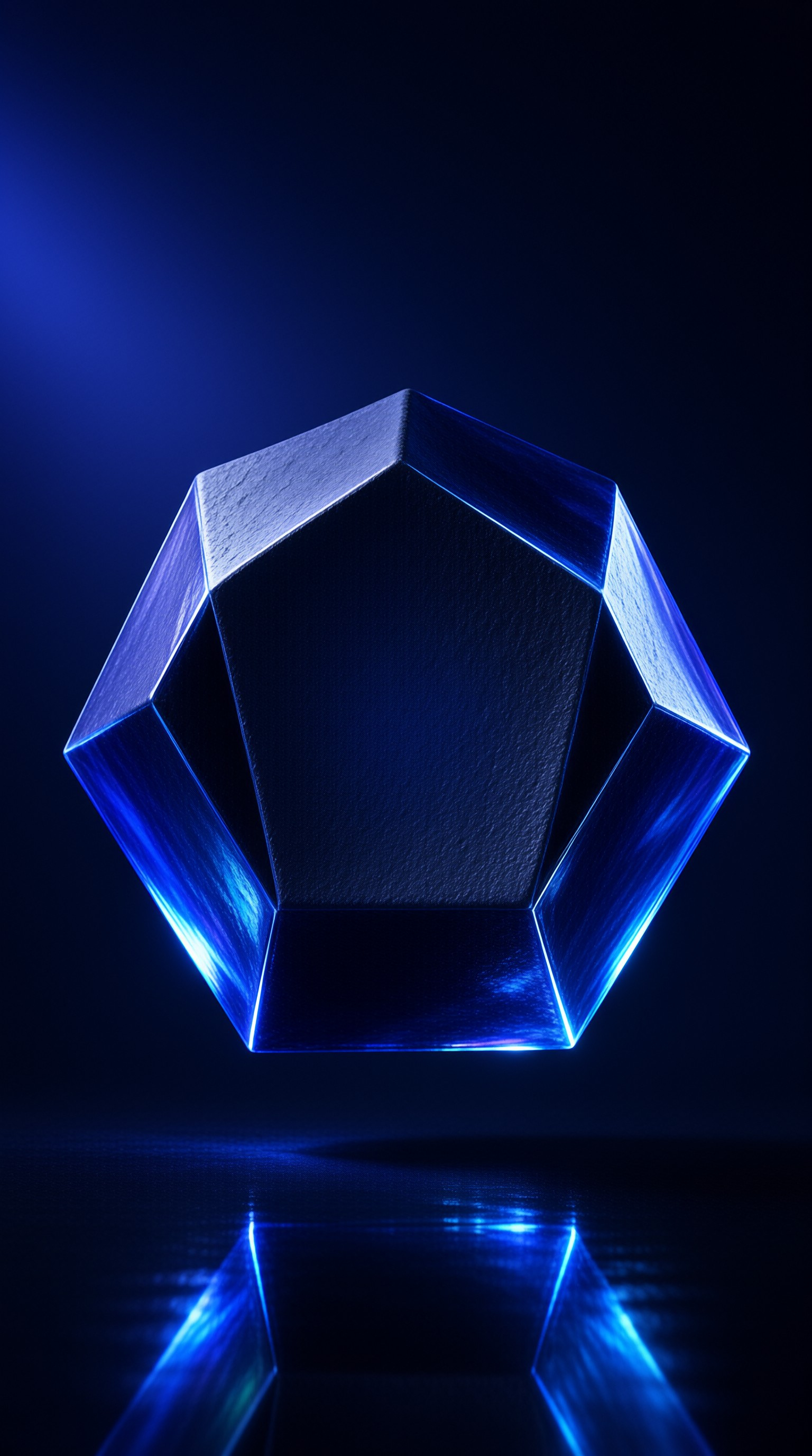 A faceted sapphire-blue crystal hovers above a glossy dark floor, its beveled edges glowing under cool studio light.