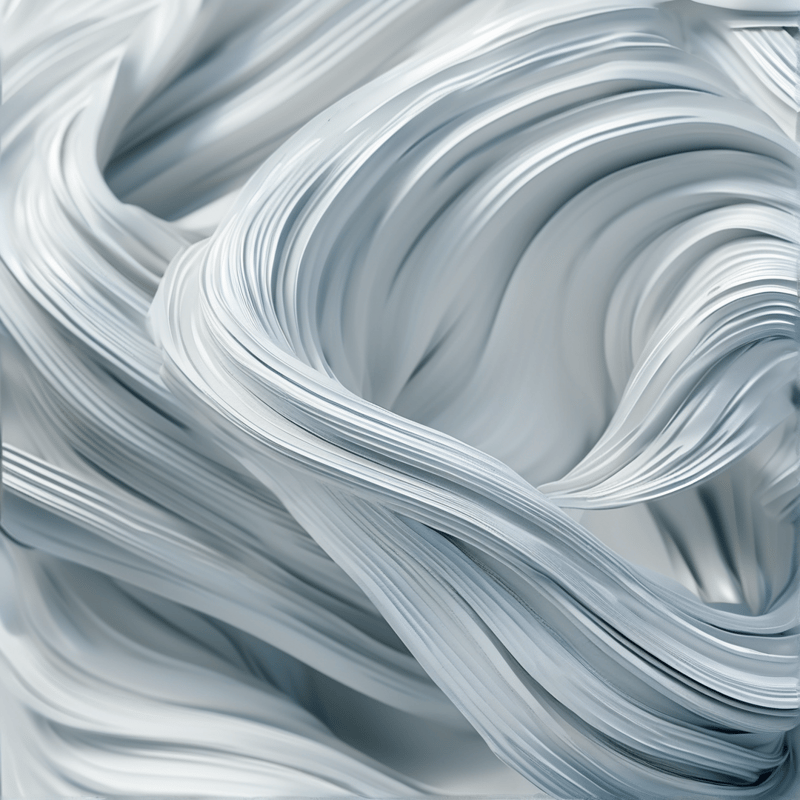 Glossy white and pale grey strands curl and overlap in a smooth abstract composition of flowing ribbons.
