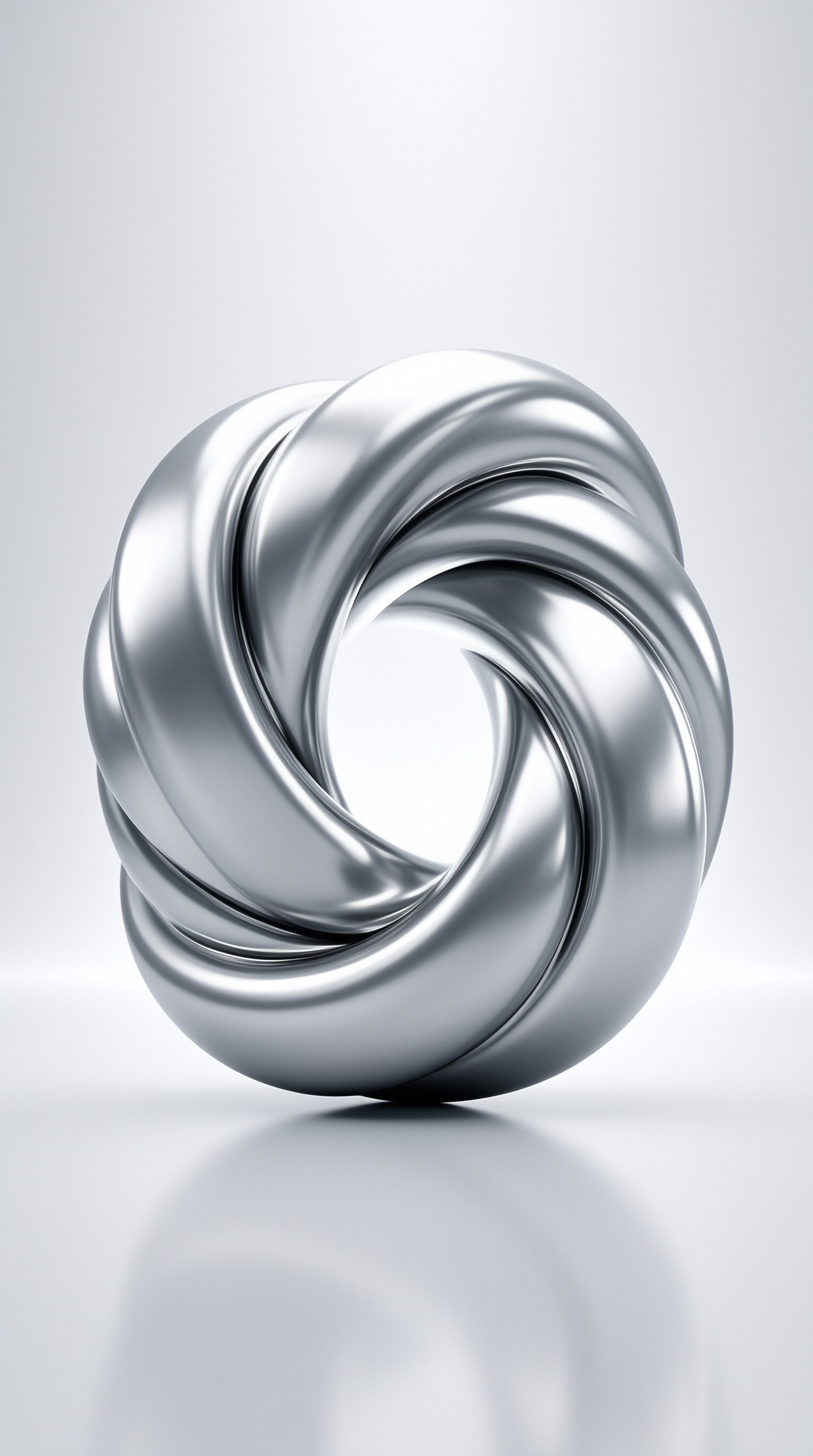 Highly reflective silver twisted metal sculpture with smooth curves on a white background with soft shadow beneath