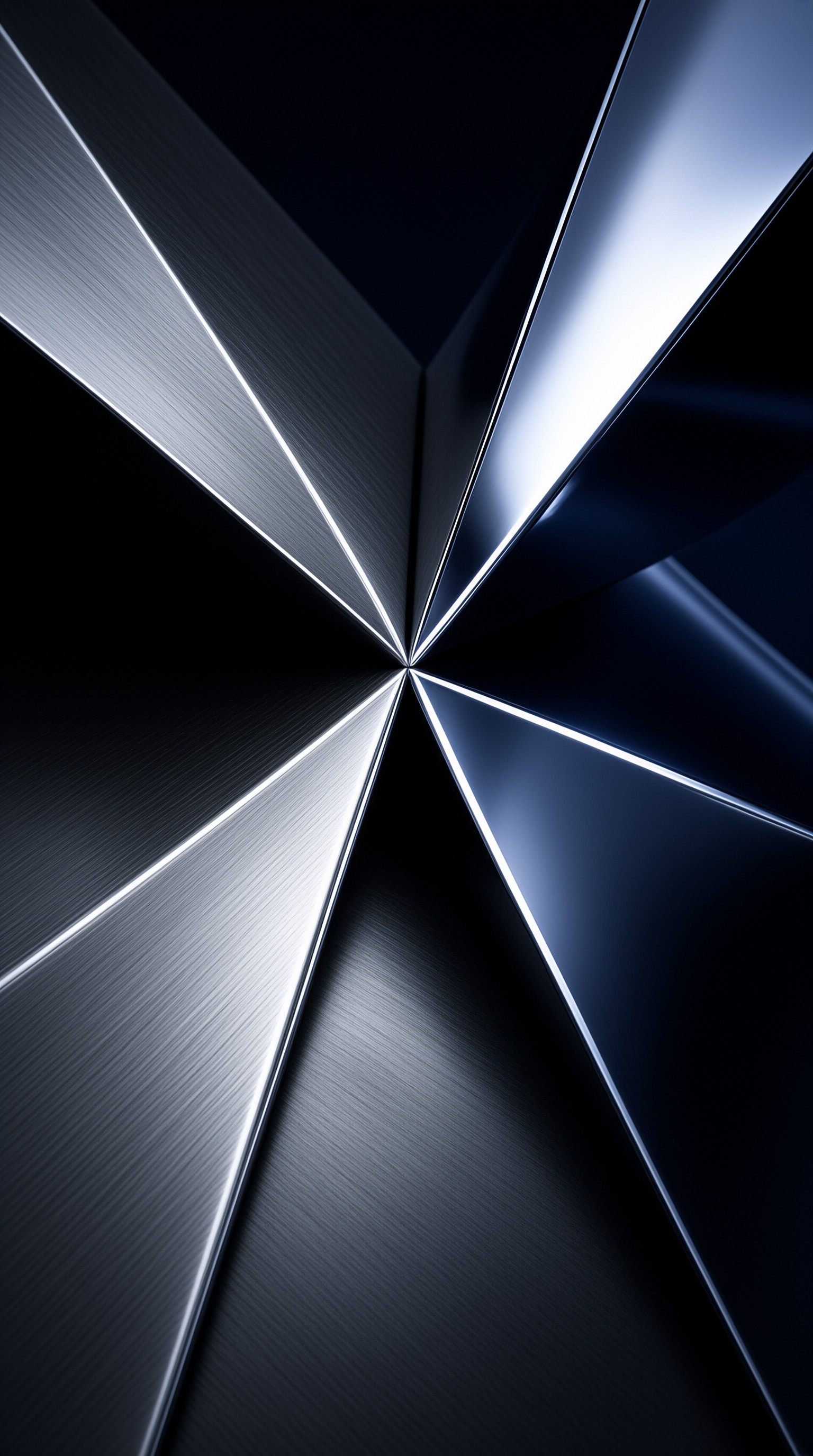 Silver metal surfaces form a star shape with bright highlights and dark blue shadows in a geometric arrangement.
