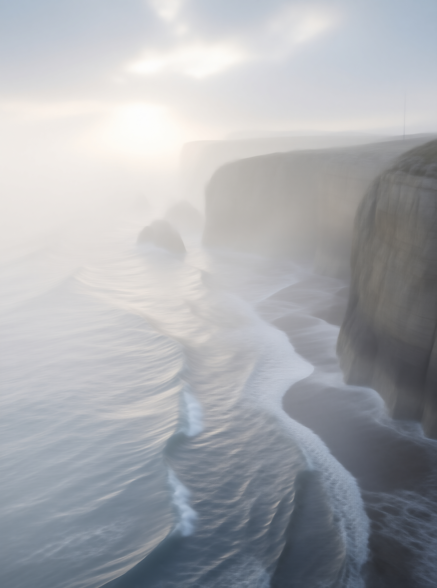 Misty Coastal Cliffs