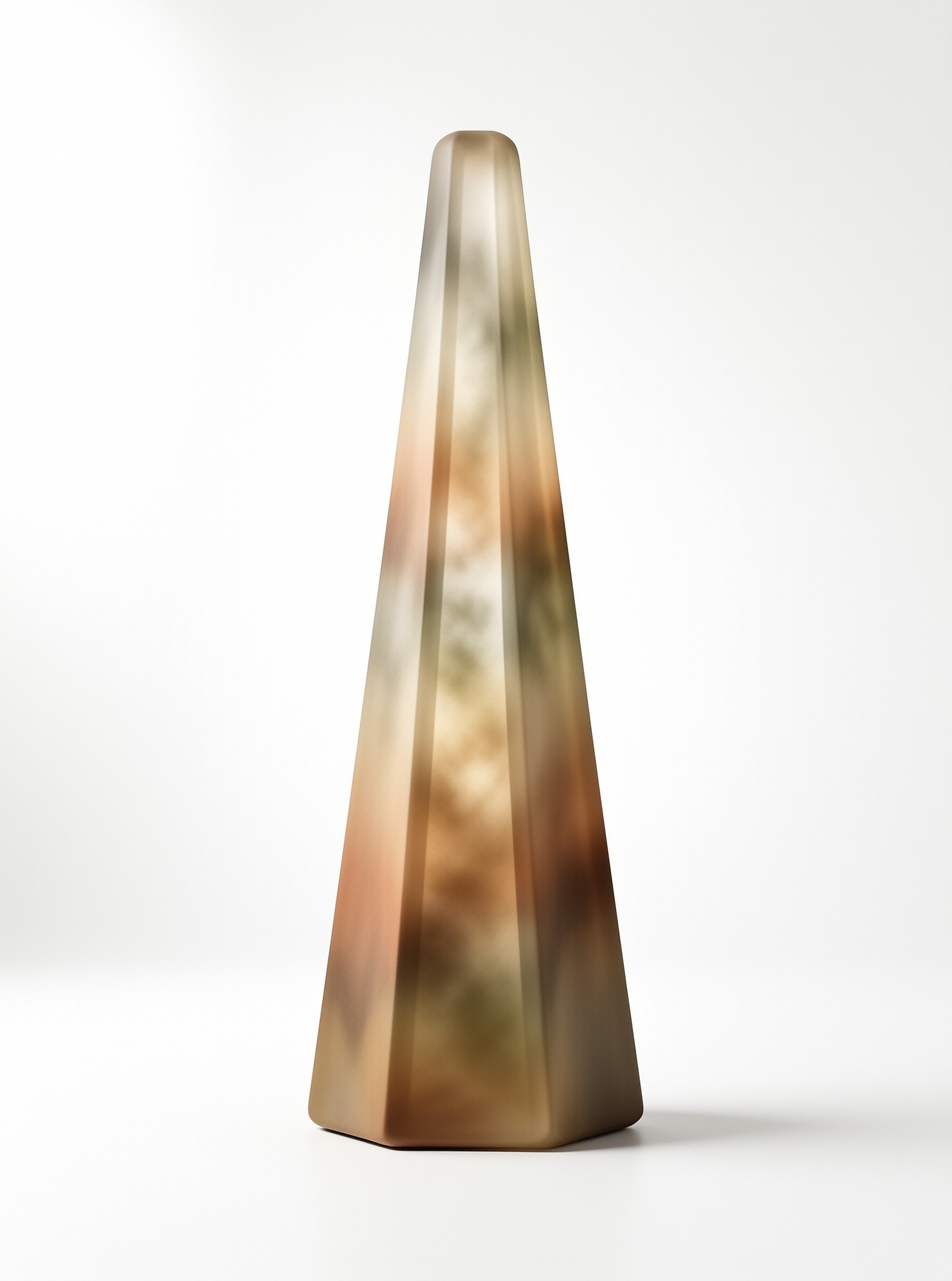 A slender tapered sculpture with metallic gold and green tones standing against a white background.
